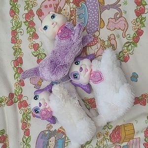 Purple and White Stuffed Animal Puppy Toy